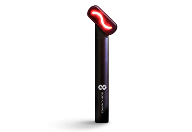 Red Light Face Wand On Grey Background